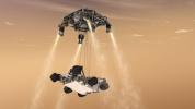 This artist's concept shows the sky crane maneuver during the descent of NASA's Curiosity rover to the Martian surface. The sheer size of the rover (over one ton, or 900 kilograms) would preclude it from taking advantage of an airbag-assisted landing.
