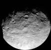 This full view of the giant asteroid Vesta was taken by NASA's Dawn spacecraft, as part of a rotation characterization sequence on July 24, 2011, at a distance of 3,200 miles and shows impact craters of various sizes and grooves parallel to the equator.