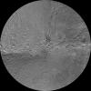 The northern and southern hemispheres of Rhea are seen in these polar stereographic maps, mosaicked from the best-available NASA's Cassini and Voyager images.