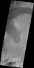 The dunes in this unnamed crater in Aonia Terra are coalescing into a sand sheet in this image from NASA's 2001 Mars Odyssey spacecraft.