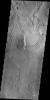 Arcuate and linear fractures cut the volcanic materials of Echus Montes in this image captured by NASA's 2001 Mars Odyssey spacecraft.