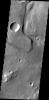 This image captured by NASA's 2001 Mars Odyssey spacecraft shows an unnamed channel on part of the highlands above Tiu Valles.