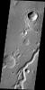 This image from NASA's 2001 Mars Odyssey spacecraft shows a portion of Nanedi Valles in Xanthe Terra.