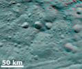 This anaglyph from NASA's Dawn spacecraft shows degraded craters in asteroid Vesta's northern hemisphere. You need 3D glasses to view this image.