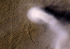 A Martian dust devil was captured winding its way along the Amazonis Planitia region of Northern Mars on March 14, 2012 NASA's Mars Reconnaissance Orbiter.