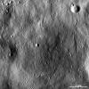 This image of asteroid Vesta from NASA's Dawn spacecraft shows an old, very degraded crater that is almost completely filled with regolith. Regolith is the fine-grained material that covers most of Vesta's surface.