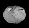 As NASA's Dawn spacecraft takes off for its next destination, this mosaic synthesizes some of the best views the spacecraft had of the giant asteroid Vesta. The set of three craters known as the 'snowman' can be seen at the top left.