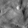 This image from NASA's Dawn spacecraft of asteroid Vesta shows the characteristic undulating surface of Vesta's southern hemisphere and many small craters, some of which make up secondary crater chains.