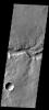 This image from NASA's 2001 Mars Odyssey spacecraft shows a portion of Naktong Vallis, located in Terra Sabaea on Mars.