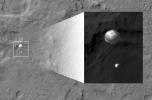 NASA's Curiosity rover and its parachute were spotted by NASA's Mars Reconnaissance Orbiter as Curiosity descended to the surface. The HiRISE camera captured this image of Curiosity while the orbiter was listening to transmissions from the rover.