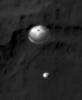NASA's Curiosity rover and its parachute were spotted by NASA's Mars Reconnaissance Orbiter as Curiosity descended to the surface. The HiRISE camera captured this image of Curiosity while the orbiter was listening to transmissions from the rover.