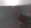 This image is a 3-D view behind NASA's Curiosity rover. The anaglyph was made from a stereo pair of Hazard-Avoidance Cameras on the rear of the rover. It has been cropped.