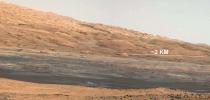 This image (cut out from a mosaic) shows the view from the landing site of NASA's Curiosity rover toward the lower reaches of Mount Sharp, where Curiosity is likely to begin its ascent through hundreds of feet (meters) of layered deposits.
