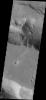 This image captured by NASA's 2001 Mars Odyssey spacecraft shows a portion of Coprates Catena, a shallow system of connecting depressions south of Coprates Chasma.