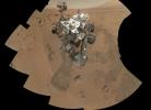 This mosaic from NASA's Mars rover, Curiosity, shows the first four of five places from which the rover's scoop obtained sand to clean the sample handling and processing system.