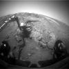 This image from NASA Mars Exploration Rover Opportunity shows the rover's arm extended for examination of a target called 'Onaping' at the base of an outcrop called 'Copper Cliff' in the Matijevic Hill area of the west rim of Endeavour Crater.