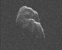This image of asteroid Toutatis was generated with data collected using NASA's Deep Space Network antenna at Goldstone, Calif., on Dec. 12 and 13, 2012 and indicates that it is an elongated, irregularly shaped object with ridges and perhaps craters.