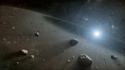This artist's concept illustrates an asteroid belt around the bright star Vega. Evidence for this warm ring of debris was found using NASA's Spitzer Space Telescope, and the European Space Agency's Herschel Space Observatory.