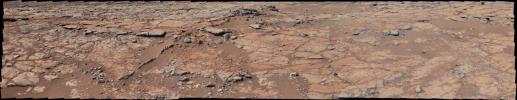 From a position in the shallow 'Yellowknife Bay' depression, NASA's Mars rover Curiosity used its right Mast Camera (Mastcam) to take the telephoto images combined into this panorama of geological diversity.
