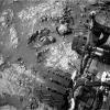 This view of Curiosity's left-front and left-center wheels and of marks made by wheels on the ground in the 'Yellowknife Bay' area comes from one of six cameras used on Mars for the first time more than six months after the rover landed.