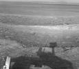 NASA's Mars Exploration Rover Opportunity used its navigation camera to record this vista looking eastward across Endeavour Crater, with the rover's own shadow in the foreground.