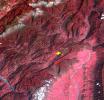 This image from NASA's Terra spacecraft highlights the epicenter of a powerful magnitude 6.6 earthquake which struck Sichuan Province in southwest China on April 20, 2013. Vegetation is displayed in red; clouds and snow are in white.