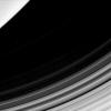 Saturn's D ring is easy to overlook since it's trapped between the brighter C ring and the planet itself. In this view from NASA's Cassini spacecraft, all that can be seen of the D ring is the faint and narrow arc as it stretches from top right of the ima