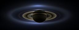 On July 19, 2013, in an event celebrated the world over, NASA's Cassini spacecraft slipped into Saturn's shadow and turned to image the planet, seven of its moons, its inner rings, and, in the background, our home planet, Earth.