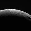NASA's Cassini orbiter peered out over the northern territory on Saturn's moon Enceladus, during its final close flyby of Enceladus, on Dec. 19, 2015.