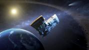 This artist's concept shows the NASA's WISE spacecraft, in its orbit around Earth. In September of 2013, engineers will attempt to bring the mission out of hibernation to hunt for more asteroids and comets in a project called NEOWISE.