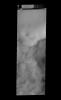 This image captured by NASA's 2001 Mars Odyssey spacecraft show the tracks of dust devils on the rim of Stoney Crater.