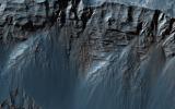 This beautiful image shows terrific layers and exposed bedrock along a cliff in west Candor Chasma, which is part of the extensive Valles Marineris canyon system as seen by NASA's Mars Reconnaissance Orbiter.