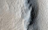 This image captured by NASA's Mars Reconnaissance Orbiter shows Tharsis Tholus, one of the smaller shield volcanoes on Mars' massive 'Tharsis Rise.'