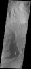 Shadows cast by the high walls and high hills within Candor Chasma are visible in this image from NASA's 2001 Mars Odyssey spacecraft. The local time is near 5:00 in the afternoon.
