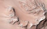 This observation from NASA's Mars Reconnaissance Orbiter shows the central hills in Hale Crater with thousands of seasonal flows on steep slopes below bedrock outcrops.