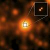 The third closest star system to the sun, called WISE J104915.57-531906, center of large image, which was taken by NASA's WISE. It appeared to be a single object, but a sharper image from Gemini Observatory, revealed that it was binary star system.