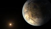 This artist's concept depicts Kepler-186f, the first validated Earth-size planet to orbit a distant star in the habitable zone, a range of distance from a star where liquid water might pool on the planet's surface.