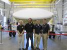 Members of the team for NASA's Low-Density Supersonic Decelerator (LDSD) stand in front of the project's saucer-shaped test vehicle at the U.S. Navy's Pacific Missile Range Facility in Kauai, Hawaii.