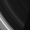 In this image from NASA's Cassini spacecraft, the spiral structures in the D ring are on display, although it is so thin as to be barely noticeable compared to the rest of the ring system.