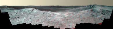 This stereo vista from the panoramic camera (Pancam) of NASA's Mars Exploration Rover Opportunity catches 'Pillinger Point,' on the western rim of Endeavour Crater, in the foreground. You need 3-D glasses to view this image.