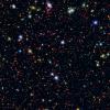 Millions of galaxies populate the patch of sky known as the COSMOS field, short for Cosmic Evolution Survey, a portion of which is shown here. Even the smallest dots in this image are galaxies, some up to 12 billion light-years away.