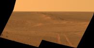 This scene from the Pancam on NASA's Mars Exploration Rover Opportunity looks back toward part of the west rim of Endeavour Crater that the rover drove along, heading southward, during the summer of 2014.