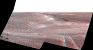 This stereo 3D scene from the Pancam on NASA's Mars Exploration Rover Opportunity looks back toward part of the west rim of Endeavour Crater that the rover drove along, heading southward, during the summer of 2014.