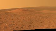 This vista from NASA's Mars Exploration Rover Opportunity shows 'Wdowiak Ridge,' from left foreground to center, as part of a northward look with the rover's tracks visible at right.