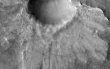 This image from NASA's Mars Reconnaissance Orbiter shows what is termed a pedestal crater, so-called because the level of the surface adjacent to the crater is elevated relative to the surface of the surrounding terrain.
