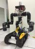 The Surrogate robot ('Surge'), built at NASA's Jet Propulsion Laboratory in Pasadena, CA., is being developed in order to extend humanity's reach into hazardous environments to perform tasks such as using environmental test equipment.