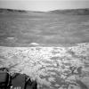 This northeast-facing view from the lower edge of the pale 'Pahrump Hills' outcrop at the base of Mount Sharp includes wind-sculpted ripples of sand and dust in the middle ground. It was taken by Curiosity's Navcam on Nov. 13, 2014.