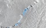 This image captured by NASA's Mars Reconnaissance Orbiter shows a small channel cutting into young volcanic lavas in a region where massive catastrophic flooding took place in the relatively recent past in the Athabasca Valles region.