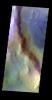 The THEMIS VIS camera contains 5 filters. The data from different filters can be combined in multiple ways to create a false color image. This false color image from NASA's 2001 Mars Odyssey spacecraft shows part of Renaudot Crater.