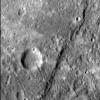 The cliff-like feature crossing this image from NASA's MESSENGER spacecraft from top to bottom is one of Mercury's famed lobate scarps, and is called Pourquoi-Pas Rupes.